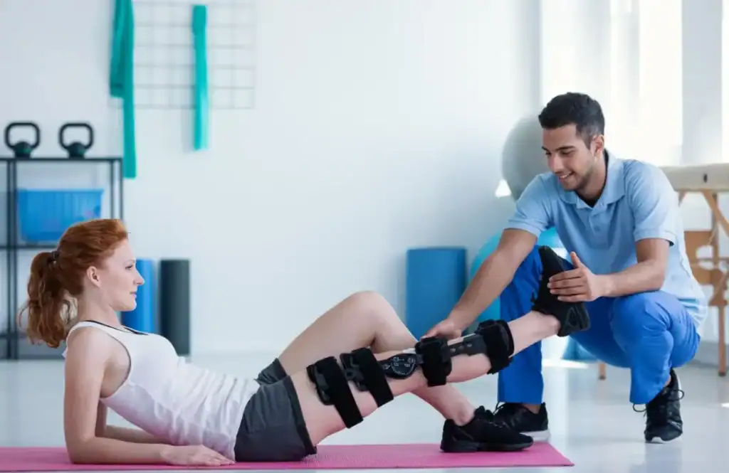 Debunking Meal Timing Myths: The Truth About Muscle Recovery 1 Woman having treatment to help muscle recovery Bellshill after an injury