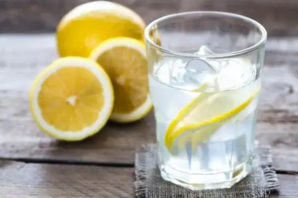 Hydration: The Secret Ingredient for a Toned Stomach and Enhanced Fitness 2 Image of lemon water to aid hydration Bellshill