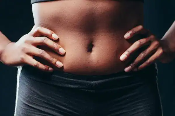Toning Your Stomach: The Ultimate Guide to Achieving a Sculpted Stomach While Shedding Pounds 1 Image of a toned stomach after non surgical treatment Bellshill